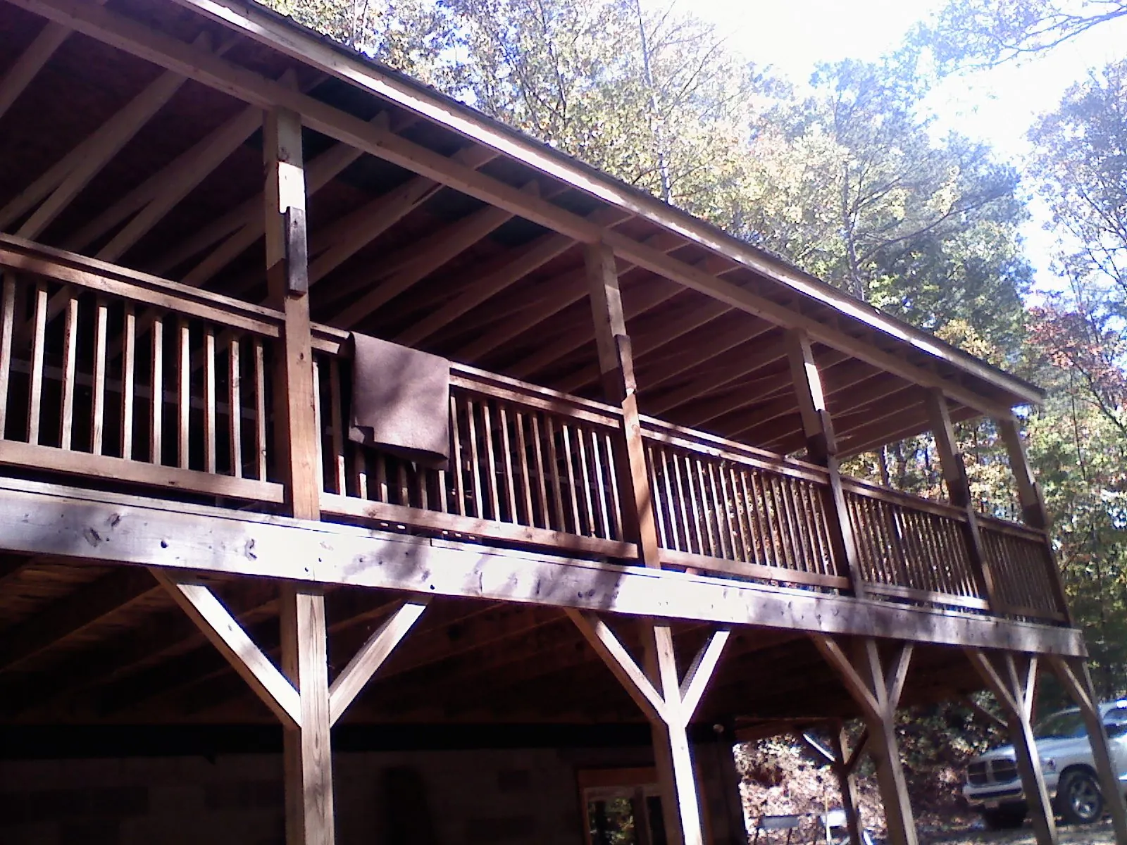 Timber framing under a new elevated porch and deck — Roof Leak Repair in East Longmeadow by Roofing Brothers